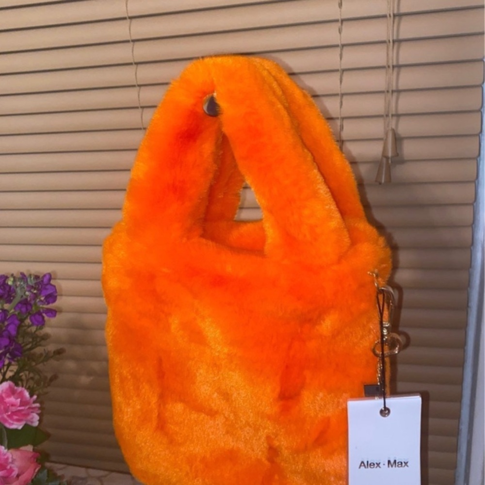Brand new orange fluffy purse